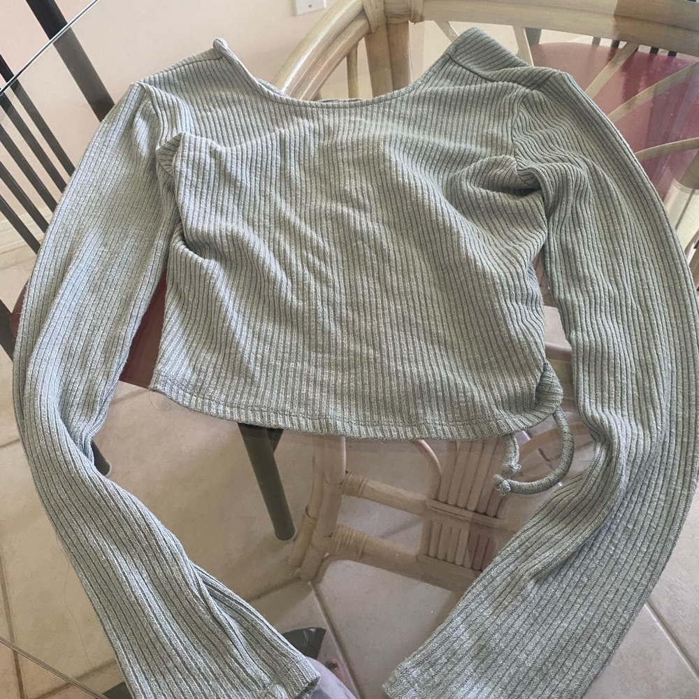Light blue Garage long sleeve, crop top with tied corset back.